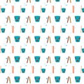 seamless pattern of blue cups and colored pencils