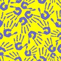 seamless pattern of blue handprints on a yellow background, texture Royalty Free Stock Photo