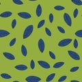 Seamless pattern of blue leaves on a green background. Strict flat design. Geometric location. Printing on fabric Royalty Free Stock Photo