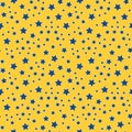 Seamless pattern of blue stars on a yellow background. Children bright pattern. Contrasting star pattern for wrapping Royalty Free Stock Photo