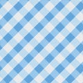 Seamless pattern of blue and white diagonal gingham plaid fabric with textured surface ideal for textile design or stylish Royalty Free Stock Photo