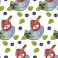 Seamless pattern of blueberries and glass of mulled wine with cinnamon stick, apple slice and leaves Royalty Free Stock Photo