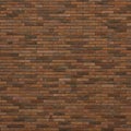 A seamless pattern of a brick wall with a uniform rectangular layout. The bricks are in Royalty Free Stock Photo