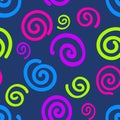 Seamless pattern with a bright colorful acid spirals on dark blue background. Royalty Free Stock Photo