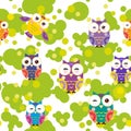 Seamless pattern - bright colorful owls and green leaves on white background. Vector Royalty Free Stock Photo