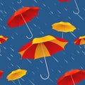 Seamless pattern with bright colorful umbrellas and rain