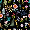Seamless pattern with bright multicolored decorative flowers and leaves on a black background Royalty Free Stock Photo