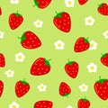 Seamless pattern with Bright red strawberries and strawberry flower on green background. Royalty Free Stock Photo