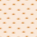 Seamless pattern with bright suns on a light background Royalty Free Stock Photo
