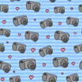 Seamless pattern with cameras and hearts. Royalty Free Stock Photo