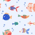 Seamless pattern cartoon colorful cute fish on a blue background in a flat style. Royalty Free Stock Photo