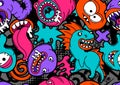 Seamless pattern with cartoon monsters. Royalty Free Stock Photo