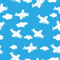 Seamless pattern with cartoon planes and clouds for texture, textiles and simple backgrounds