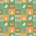 Seamless pattern with cat kitten on a green-orange checkered background Royalty Free Stock Photo