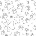 Seamless pattern with cats footprints, outlines Royalty Free Stock Photo