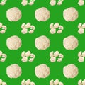 Seamless pattern with cauliflower on green background. Vegetable abstract seamless pattern