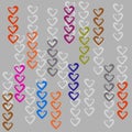 Seamless pattern of chains of multicolored hearts from watercolor brush on gray background.