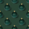 Seamless pattern with Christmas balls on green background Royalty Free Stock Photo