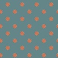 Seamless pattern of Christmas candies on blue background