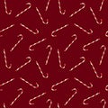 Seamless pattern with Christmas candies on bright maroon background. Creative minimal X mas art. Copy space. Flat lay