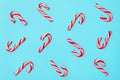 Seamless pattern from christmas candy canes, festive design paper