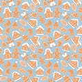 Seamless pattern of christmas gingerbread house cookies, man, bell, ball, mittens, hat on blue background Royalty Free Stock Photo