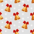 Seamless pattern, Christmas golden bells with red bows on the background of snowflakes. Textile, christmas print Royalty Free Stock Photo