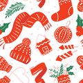 Seamless pattern with christmas hand-drawn elements. Socks, scarf, knit hat, mittens, christmas ornament, pine branches, cookies Royalty Free Stock Photo