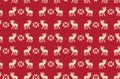 Seamless pattern of Christmas reindeer pixel art on a red background