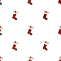 Seamless pattern with christmas socks on white background. Gingerbread man and candies. Red green sock. Vector illustration Royalty Free Stock Photo