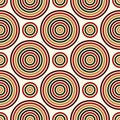 Seamless pattern in Christmas traditional colors. Abstract background with bright round vortexes.