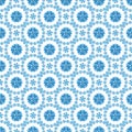 Seamless pattern with circle beautiful floral ornament in blue and light blue colors in gzhel style on a white background