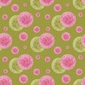 Seamless pattern with circles of different sizes pink and green colors on a green background