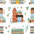 Seamless pattern with city buildings on white background. Backdrop with facades of bakery or bakeshop, book store, plant