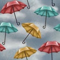 Seamless pattern with cloudy and rainy sky. Multicolored umbrellas. Blue, red and yellow. Weather.