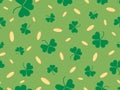 Seamless pattern with clover leaves and golden coins. Festive background for Saint Patrick\'s Day Royalty Free Stock Photo