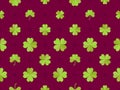 Seamless pattern with clover for Saint Patrick`s Day. Green four-leaf clovers on a red background. Festive background for Royalty Free Stock Photo