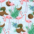 Seamless pattern of coconut, half, palm leaves and pink flamingos on blue background