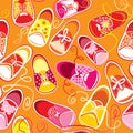 Seamless pattern, colored children gumshoes on orange background