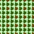 Seamless pattern with colored leaves on a light green background that can be used on textiles, wallpaper, carpet, and brown paper