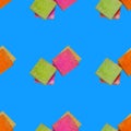 Seamless pattern of colored pieces of sugar on blue background