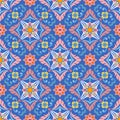 Seamless pattern with colorful abstract flower on blue  background. Royalty Free Stock Photo