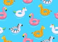 Seamless pattern of colorful animals floats cute kids toys on blue background Royalty Free Stock Photo