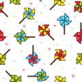 Seamless pattern of colorful child toy windmills on white background