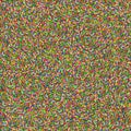 Seamless pattern of colorful decorative sprinkles or confetti on glaze