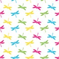 Seamless pattern with colorful dragonflies