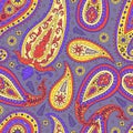 Seamless pattern with colorful Paisley motifs on purple background Royalty Free Stock Photo