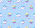 Seamless pattern of colorful rainbow sweet donuts. Junk food background