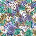 Seamless pattern of colorful striped hearts