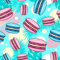 Seamless pattern of colorful sweet macarons cakes with tropic leaves. French macaroons. Junk food background